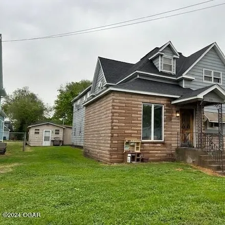 Buy this 8 bed house on 364 West Coler Street in Neosho, MO 64850