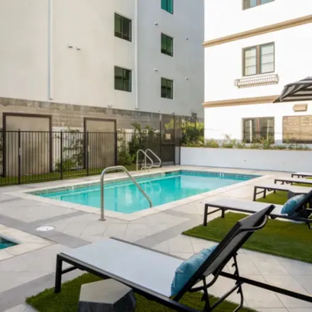 Rent this 3 bed apartment on 1353 South Orange Grove Avenue in Los Angeles, CA 90019