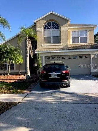 Rent this 4 bed house on 1184 Lake Biscayne Way in Meadow Woods, Orange County