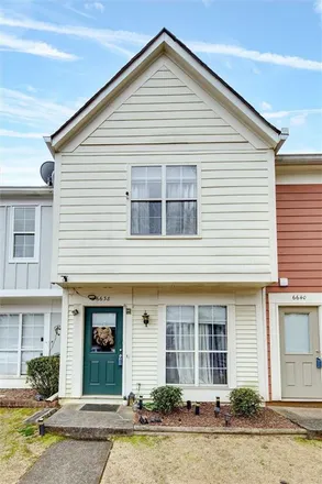 Rent this 2 bed townhouse on 6638 Witherington Ct