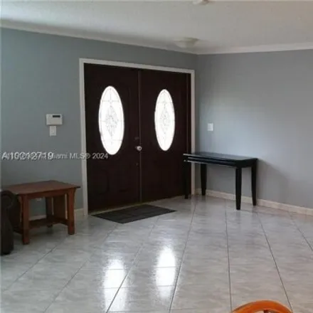 Rent this 5 bed house on 7928 Northwest 190th Lane in Hialeah Gardens, FL 33015
