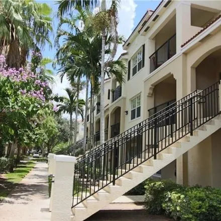 Rent this 2 bed condo on Garrett Academy in West Sample Road, Coral Springs