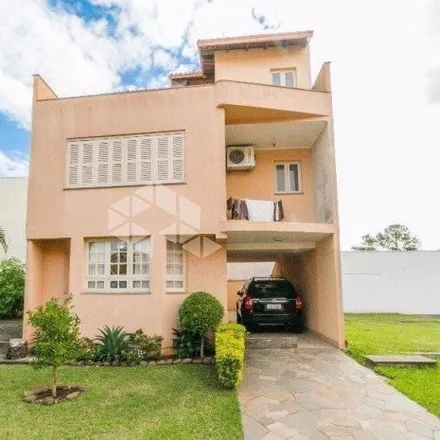 Buy this 3 bed house on Rua Elízio Abate Crivella in Jardim Itu, Porto Alegre - RS