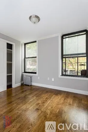 Rent this 2 bed apartment on 279 E 10th St
