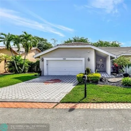 Buy this 4 bed house on Woodmont Country Club in Northwest 79th Street, Tamarac