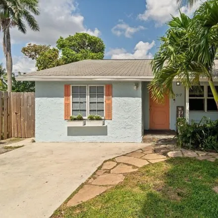 Buy this 3 bed house on 1357 South N Street in Lake Worth Beach, FL 33460