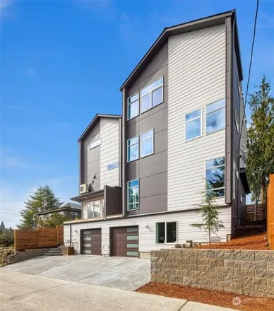 Buy this 4 bed house on 3408 49th Avenue Southwest in Seattle, WA 98116