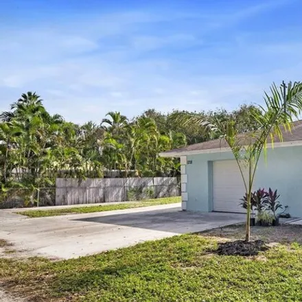 Image 1 - 1690 Ridge Road, Juno Ridge, Palm Beach County, FL 33408, USA - House for rent