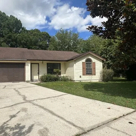 Buy this 4 bed house on Huntington Woods Circle North in Jacksonville, FL 32222