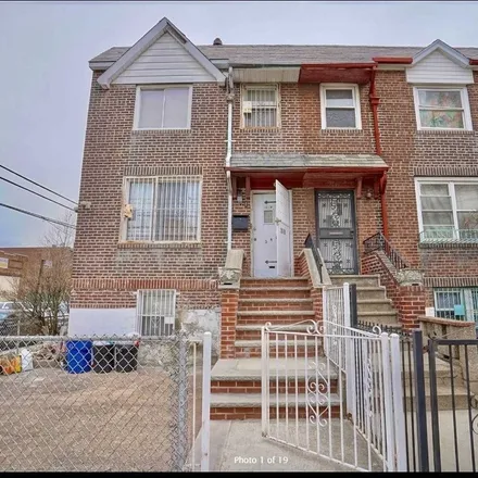 Buy this 6 bed townhouse on 23-17 37th Avenue in New York, NY 11106