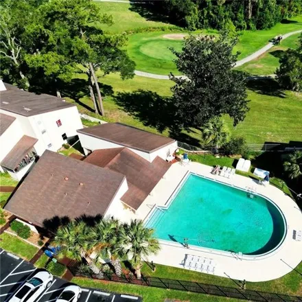 Rent this 1 bed condo on Ocala Golf Club in 3130 East Silver Springs Boulevard, Ocala