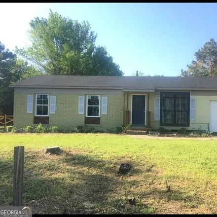 Buy this 4 bed house on 3844 Village Green Drive in Macon, GA 31206