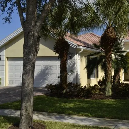 Rent this 3 bed house on Villagewalk Circle in Wellington, FL