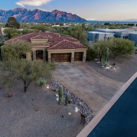 Buy this 4 bed house on 11950 North Mesquite Sunset Place in Oro Valley, AZ 85742