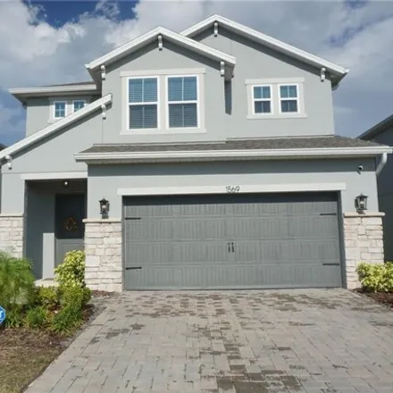 Rent this 4 bed house on 1569 Leaf Ln in Kissimmee, Florida