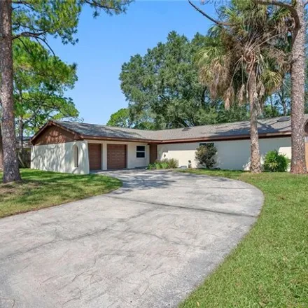 Buy this 4 bed house on 8363 West Pocahontas Avenue in Town 'n' Country, Hillsborough County