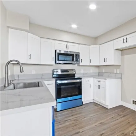 Rent this 3 bed condo on Garfield Avenue in Bell Gardens, CA 90040