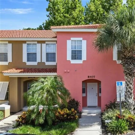 Buy this 3 bed townhouse on 8423 Blue Lagoon Drive in Four Corners, FL 34747
