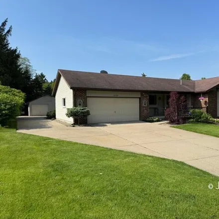 Buy this 4 bed house on 2712 Thrush Drive in Jenison, MI 49428