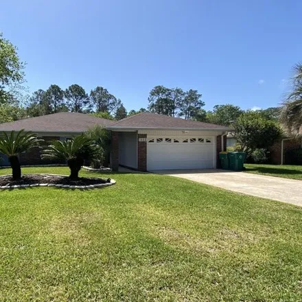 Rent this 3 bed house on 1522 Royal Palm Drive in Niceville, FL 32578
