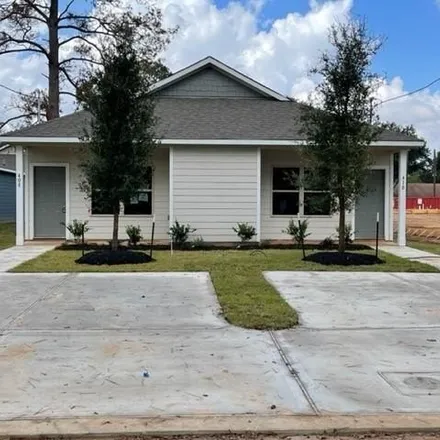 Rent this 3 bed house on 412 Avenue H in Conroe, TX 77301