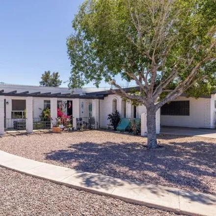 Buy this studio house on 1137 North Wedgewood Circle in Mesa, AZ 85203