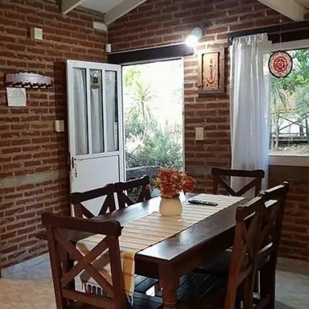 Buy this 5 bed house on Los Crisantemos in Partido de La Costa, 7112 Costa del Este