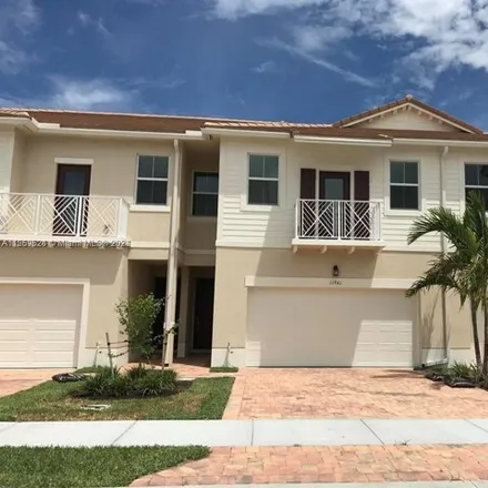 Buy this 3 bed townhouse on Park Central in Royal Palm Beach, Palm Beach County