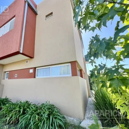 Buy this 3 bed house on Calle 13 in Villa Parque Sicardi, 1909 Buenos Aires