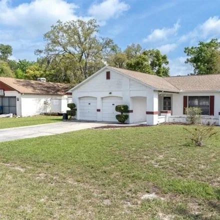 Buy this 3 bed house on 7370 Philatelic Drive in Spring Hill, FL 34606