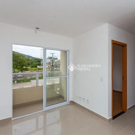 Buy this 2 bed apartment on Foro Regional do Alto Petrópolis in Avenida Protásio Alves 8144, Morro Santana