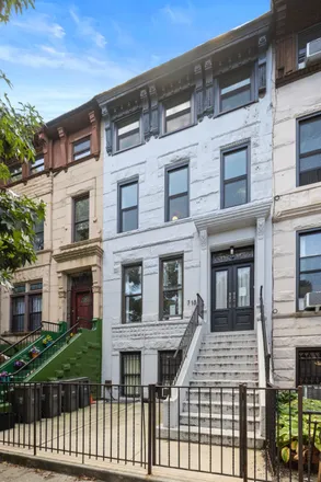 Buy this 4 bed townhouse on 718 Greene Avenue in New York, NY 11221
