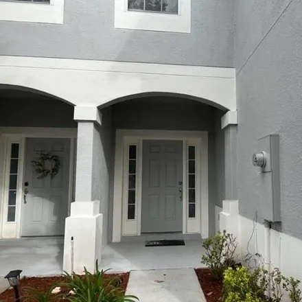 Rent this 3 bed townhouse on 949 Rock Harbor Avenue in Orange County, FL 32828