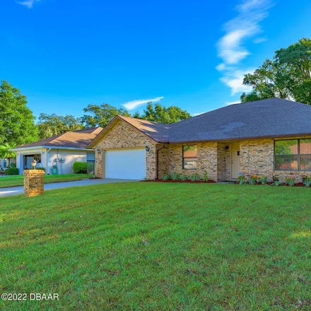 Rent this 3 bed house on 1523 Poplar Drive in Ormond Beach, FL 32174