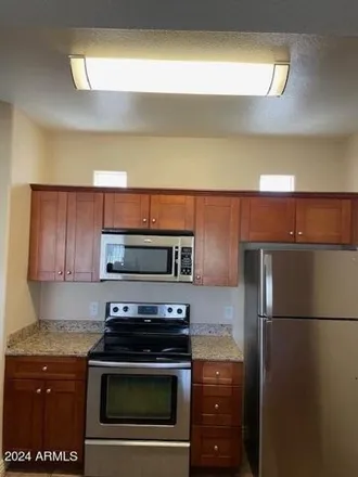 Rent this 3 bed apartment on East Palisades Boulevard in Fountain Hills, AZ 85268