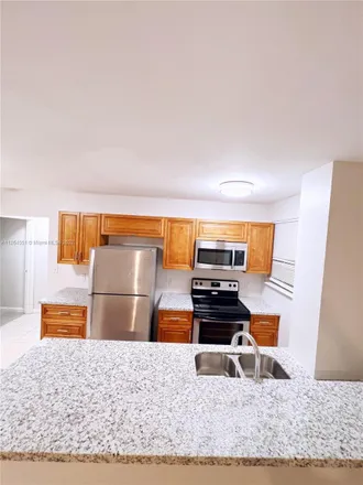 Rent this 3 bed condo on 14230 Northwest 22nd Avenue in Opa-locka, FL 33054