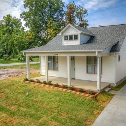 Buy this 3 bed house on 1086 Faxon Avenue in Memphis, TN 38105