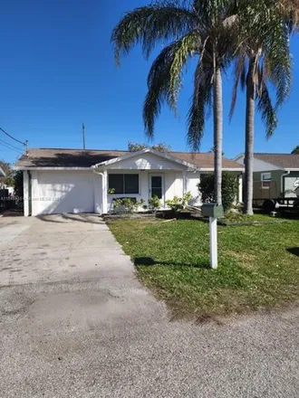 Buy this 3 bed house on 13882 Muriel Avenue in Hudson, FL 34667