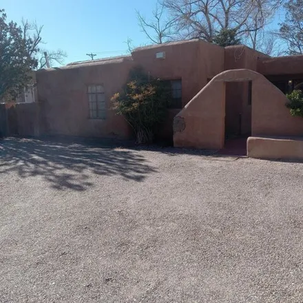 Buy this 3 bed house on 1055 Washington Street Southeast in Albuquerque, NM 87108