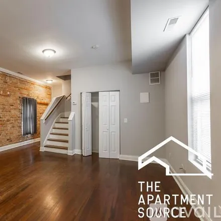 Rent this 3 bed apartment on 3134 W Warren Blvd