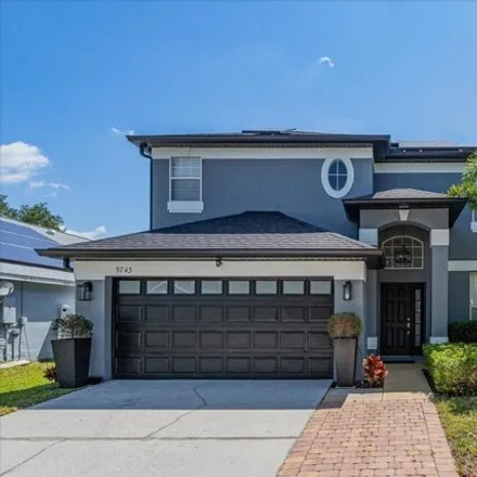 Buy this 4 bed house on 8240 Sommerville Drive in Orlando, FL 32829