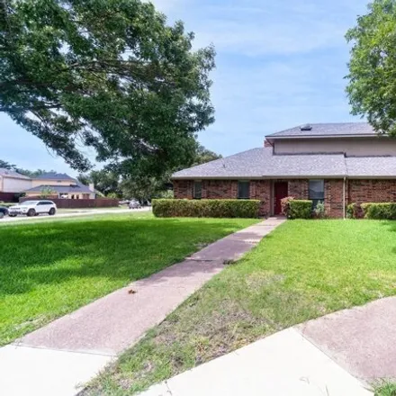 Rent this 3 bed house on 1911 Lansdown Drive in Carrollton, TX 75010