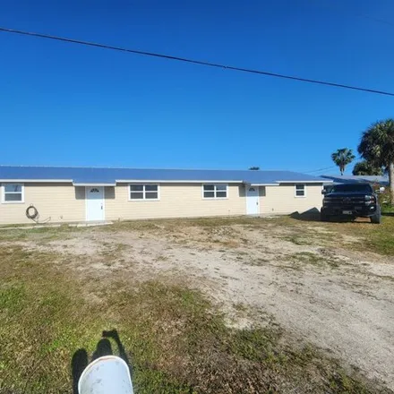 Buy this 4 bed house on 1249 Chobee St in Okeechobee, Florida