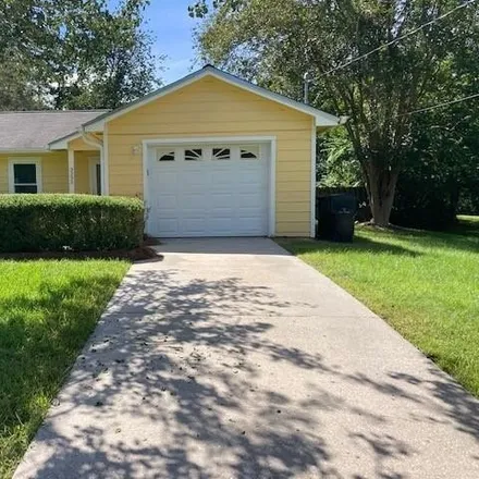 Rent this 3 bed house on 3232 Riddle Drive in Tallahassee, FL 32309