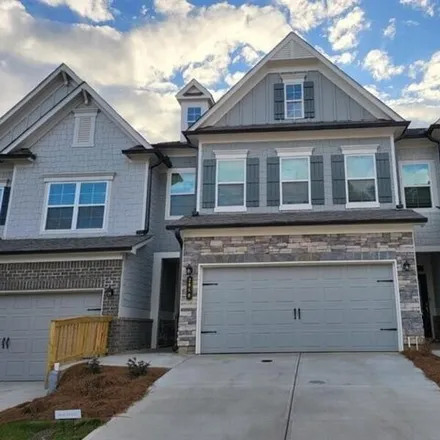 Buy this 3 bed townhouse on unnamed road in Suwanee, GA 30174