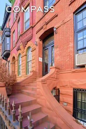 Buy this 6 bed townhouse on 168 West 130th Street in New York, NY 10027