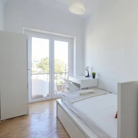Rent this 9 bed room on Edifício Entrecampos 28 in Rua de Entrecampos 28, 1000-151 Lisbon