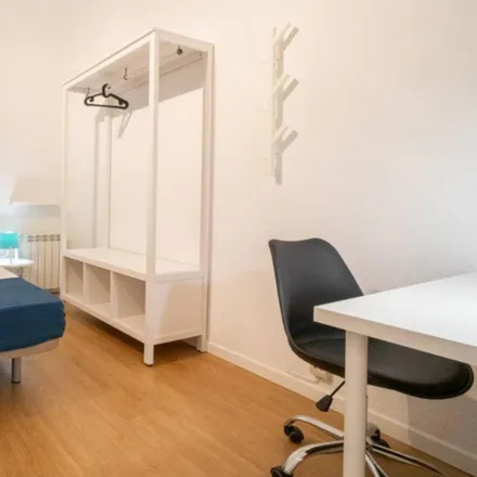 Rent this 11 bed room on Calle de Fuencarral in 36, 28004 Madrid