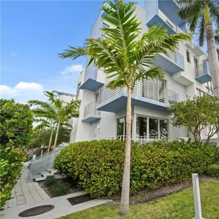 Buy this 3 bed townhouse on 155 North Shore Drive in Isle of Normandy, Miami Beach