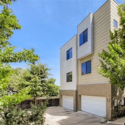 Rent this 3 bed condo on 707 Cardinal Lane in Austin, TX 78704